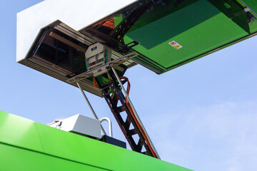 HANNOVER / GERMANY - MAY 13, 2018: Base station from a green electric bus