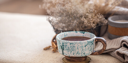 Cozy home still life with a Cup of tea on the table.