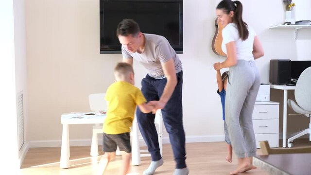 Family dance. Happy dancing people with parents and kids. Healthy lifestyle.