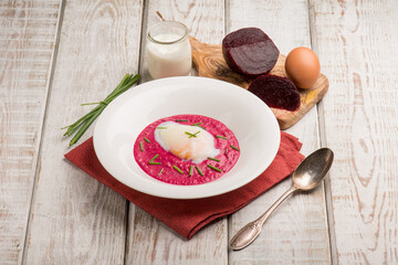 beet cream witn poche eggs and chive