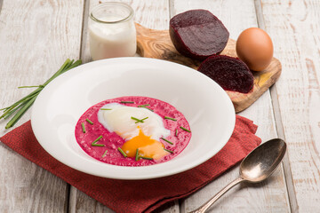 beet cream witn poche eggs and chive