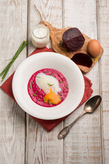 beet cream witn poche eggs and chive