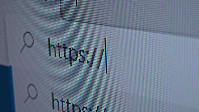Browser bar with HTTPS WWW text and cursor. Typing in web browser. Close up 4K ULTRA HD HQ video footage.