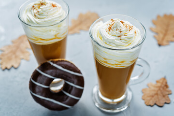 Pumpkin spice latte with whipped cream and cinnamon