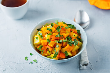 Pumpkin potato carrot stew in the bowl