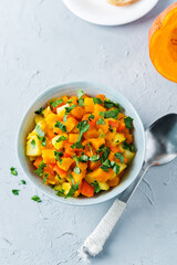 Pumpkin potato carrot stew in the bowl