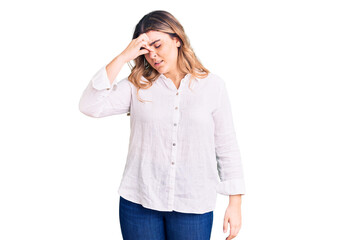 Fototapeta premium Young caucasian woman wearing casual clothes tired rubbing nose and eyes feeling fatigue and headache. stress and frustration concept.