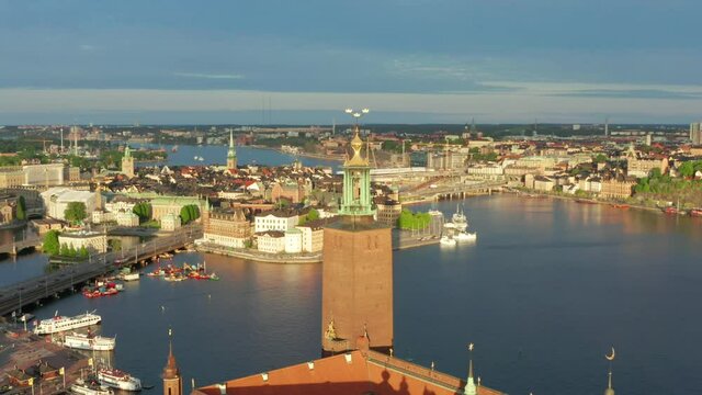 Stockholm Sweden City Hall golden crowns. Rotating drone shot parallax effect