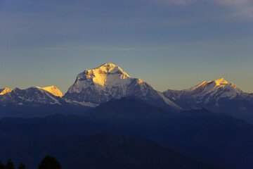 Fototapeta na wymiar Sunrise view on Annapurna Mountain Range from Poon Hill. Viewpoint on the Annapurna Circuit.