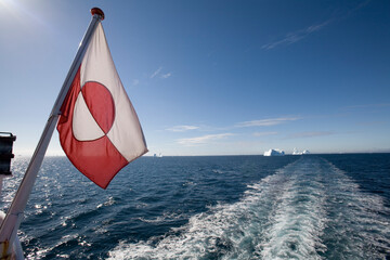Greenlandic Flag on Arctic Umiaq Line Ferry, Greenland © Paul