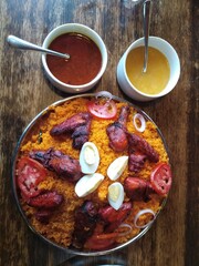 Red rice with chicken fried 