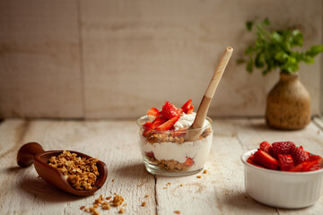 Delicious Strawberry parfait on a wooden background