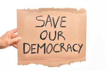 Cardboard banner with SAVE OUT DEMOCRACY text asking for political rights over isolated white background