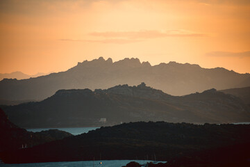 Views of the rocks and peaks of the La Maddalena archipelagos in Sardinia, Italy, from the deserted island of Caprera. Natural reserve landscapes.
