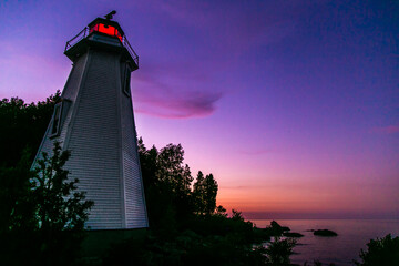 Magic sunset on Lighthouse in Tobermory, Bruce Peninsula, Ontario - Canada