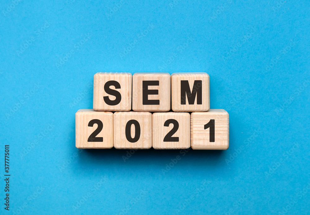 Poster sem - text concept on wooden cubes with gradient blue background
