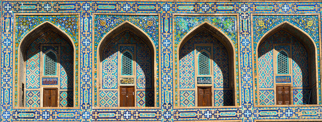 Pishtaq and spandrel with detailed mosaic at Samarkand, Uzbekistan. Islamic architecture with...