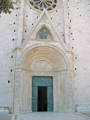 Fototapeta na wymiar Italy, Marche, main door of Fermo Cathedral on the wide plane of Girfalco.