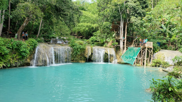 Cambugahay Falls create a beautiful swimming pool in the middle of the forest