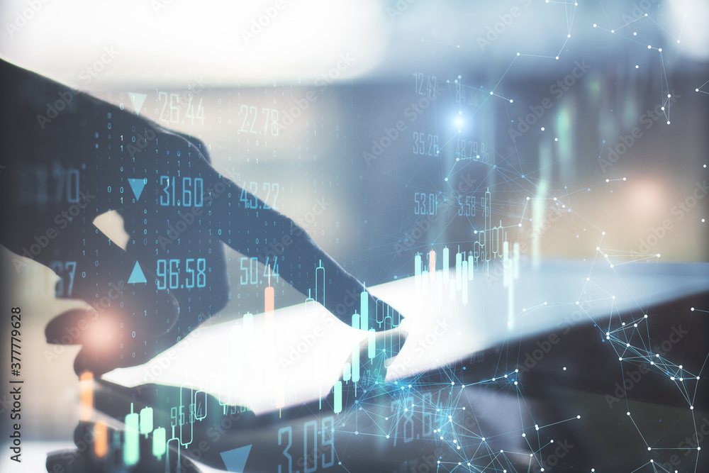 Poster close up of man hand using tablet with business charts.