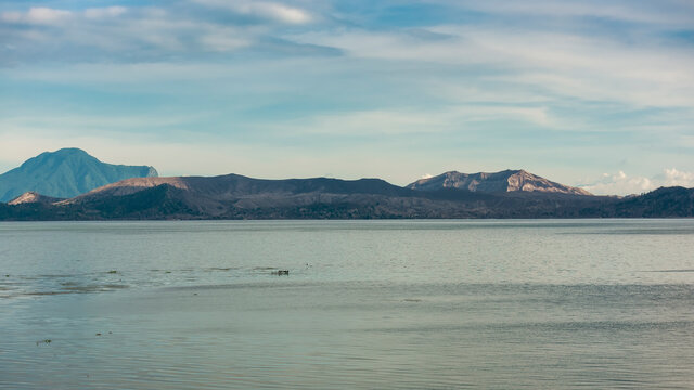 Taal volcano and lake, part of a massive caldera. Mt. Maculot in the left of picture. Late afternoon shot.