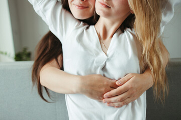 Two young women in love embracing. Relationships
