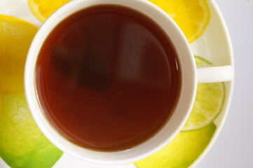 Hot herbal tea in a bright, colorful cup.
