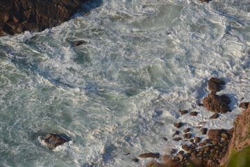 Sea and ocean foam, waves, rocks, blue water from Portugal Cabo da Roca