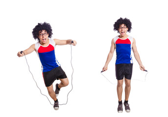 Fototapeta na wymiar Guy jumps with skipping rope isolated on white