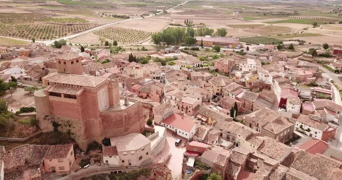 View from drone of Spanish village Cervera de la Canada and church of Santa Tecla, part of the UNESCO World Heritage Site