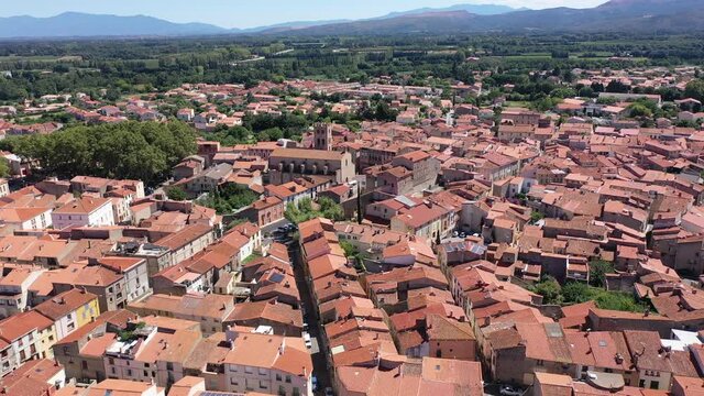 Panoramic view from above on the picturesque city Millas. France. High quality 4k footage