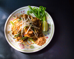 Pad Thai with Prawn, crushed peanut and a slice of lime.