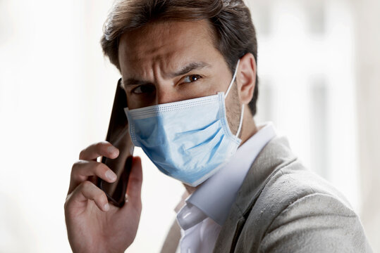 Young businessman overwhelmed with work