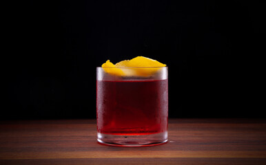 Old pal.  Rye whiskey, dry vermouth, campari served with a lemon peel and large rock.