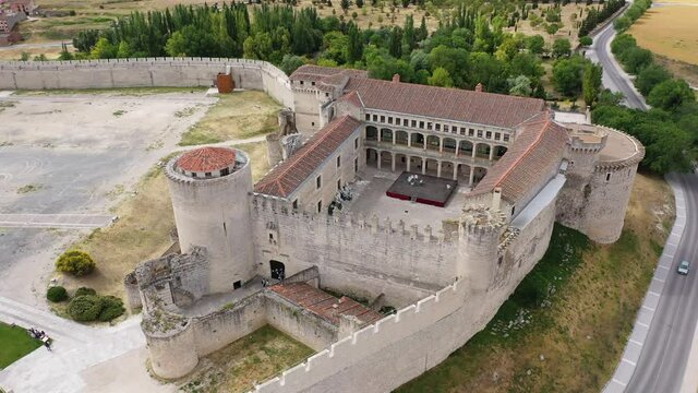 Scenic view from drone of Cuellar cityscape with medieval Castle of Dukes of Alburquerque, Spain