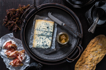 French Cheese with rustic tine tableware & cutlery