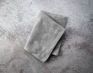 Kitchen napkins on a stone background