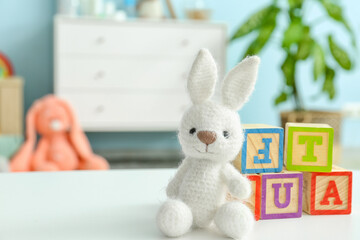Children's toys on table in room