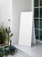 blank white advertising stand on entrance of coffee shop / background with space for text or image