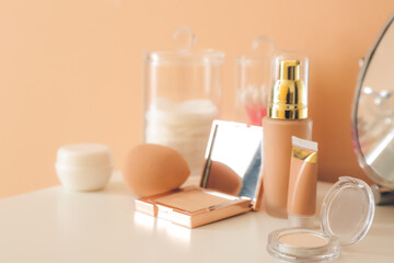 Set of decorative cosmetics on dressing table