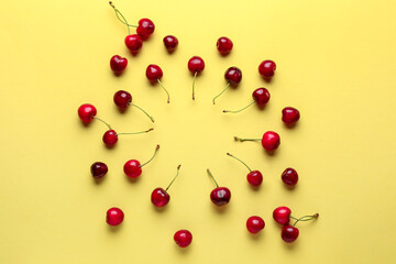 Ripe sweet cherry on color background