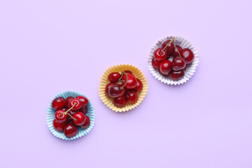 Ripe sweet cherry on color background