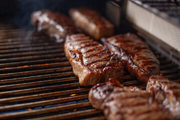 New York Strip Cut Beef - Barbeque Meat on a Grill, ready to Eat, with Copy Space