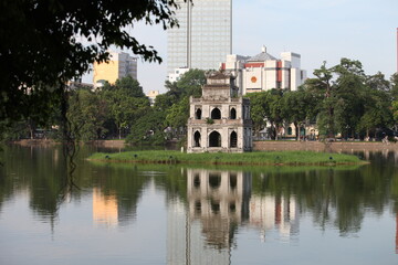 Fototapeta na wymiar The Turtle Tower (Thap Rua) on Hoan Kiem Lake (Sword Lake) Hanoi, Vietnam