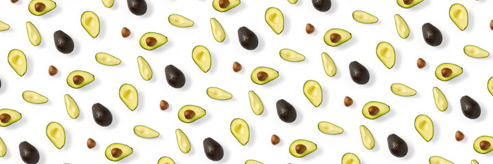 Avocado banner. Background made from isolated Avocado pieces on white background. Flat lay of fresh ripe avocados and avacado pieces.