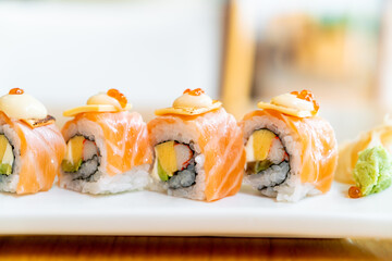 salmon roll sushi with cheese on top