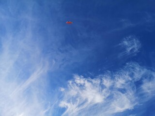 Blue sky with feathery clouds