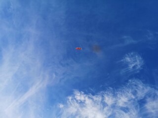 Blue sky with feathery clouds
