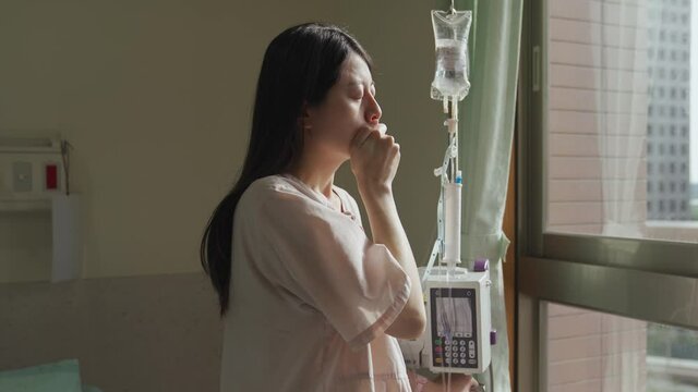 asian japanese woman patient thinking about her illness is crying with sadness brimming over from her heart