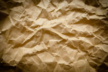 Crumpled brown paper texture and background